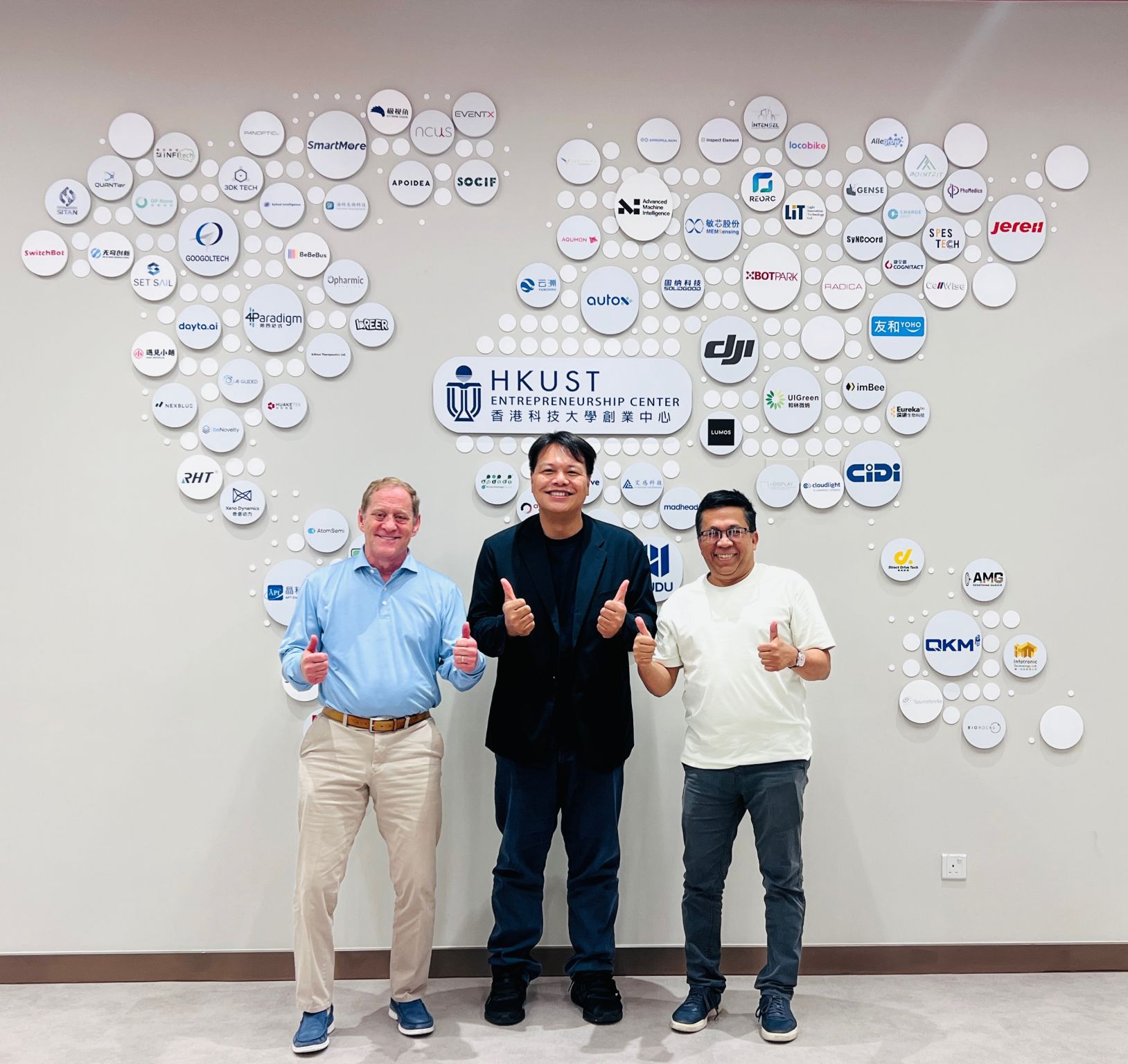 Dr. Mazhar Islam and Dr. Bobby Savoie pose with Cyrus Choi at the HKUST Entrepreneurship Center during their visit to the Hong Kong University of Science and Technology.